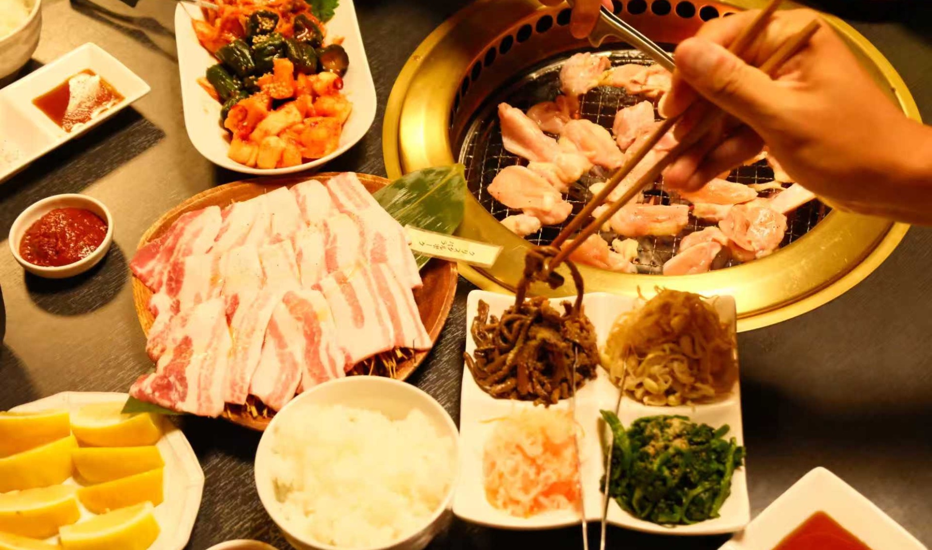 Japanese BBQ and local dishes on a table